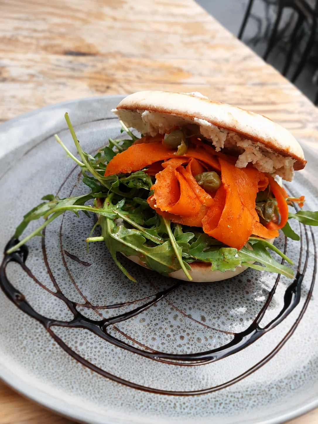 A savoury sandwich with carrot and rocket at eightyeight Cafe