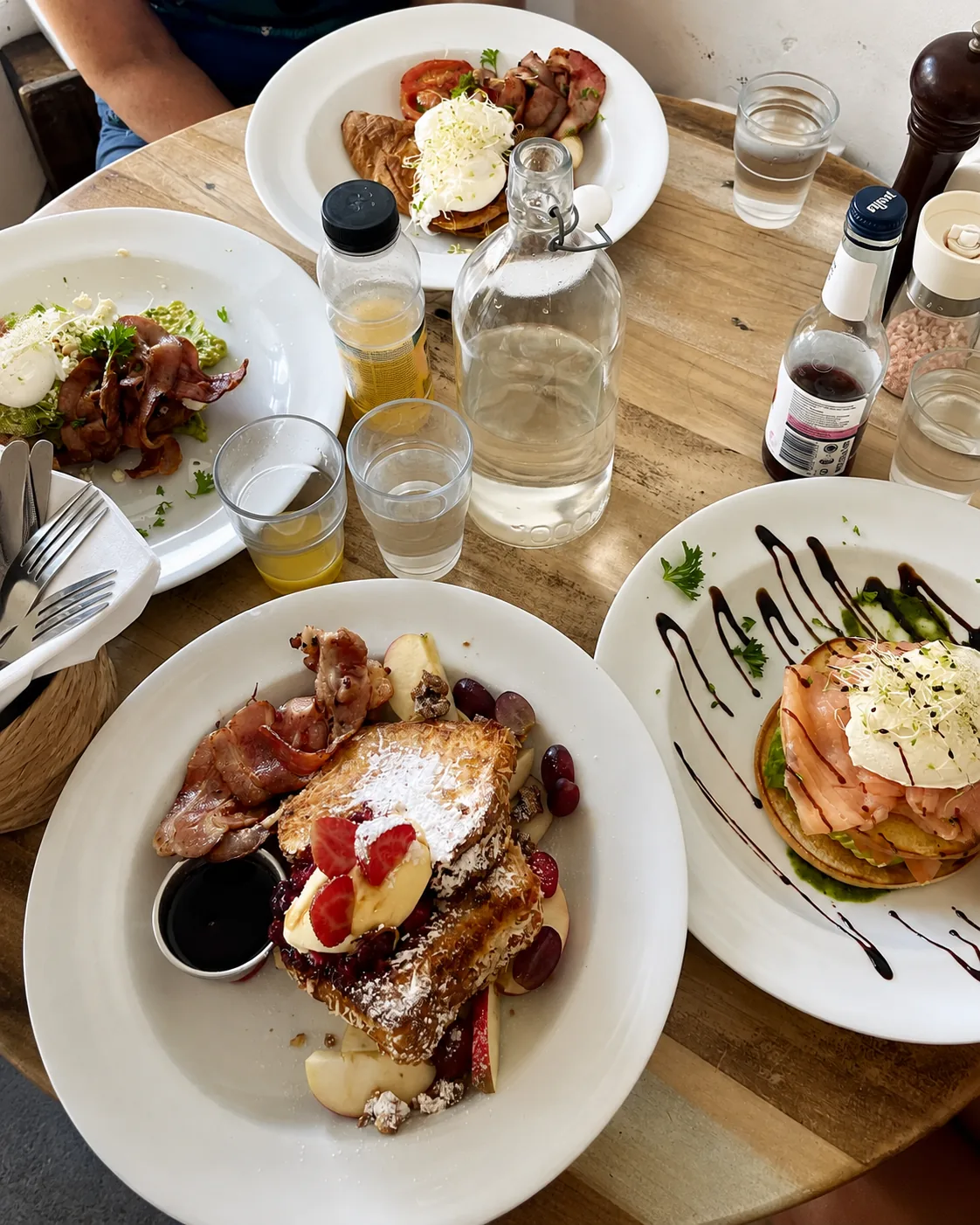 Breakfast plates shared around a table at eightyeight Cafe